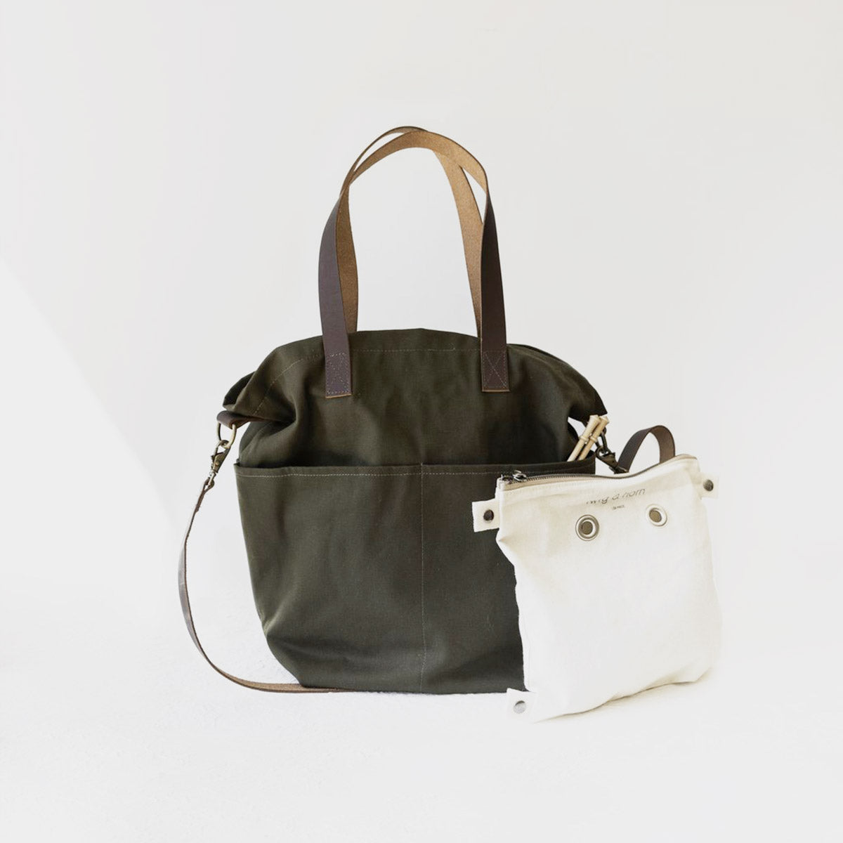 Présentation du sac en toile avec anses en cuir Crossbody de Twig&Horn en coloris Olive