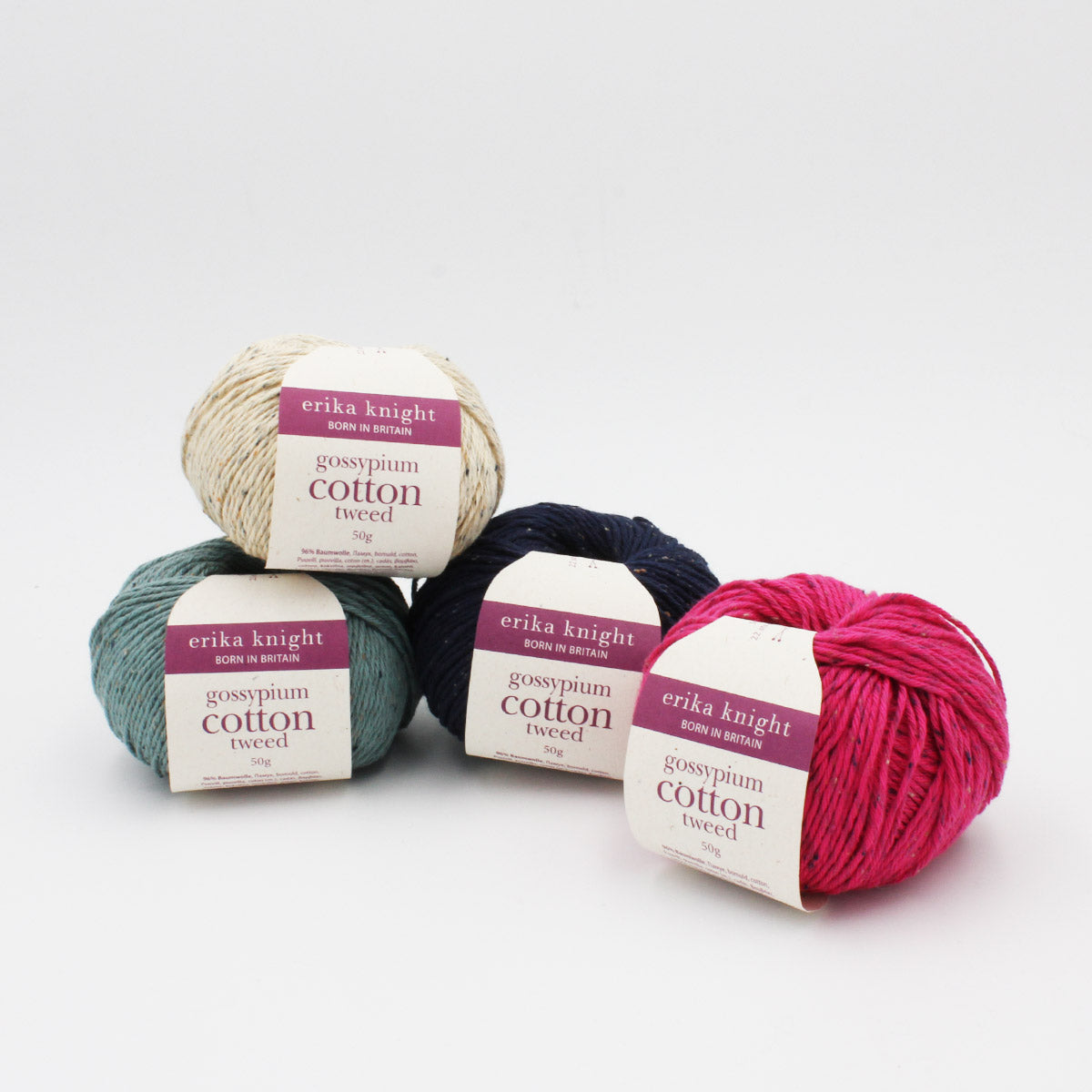 Présentation de 4 pelotes de Gossypium Cotton Tweed d'Erika Knight dans des coloris assortis