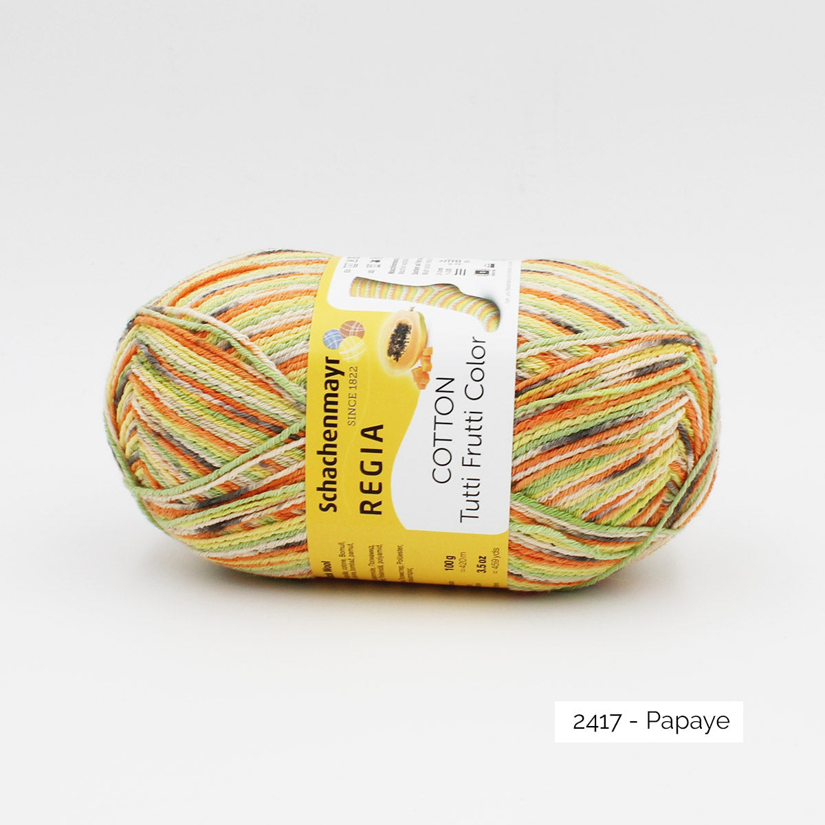 Une pelote de fil à chaussettes Regia coloris Papaye de la gamme Tutti Frutti Cotton