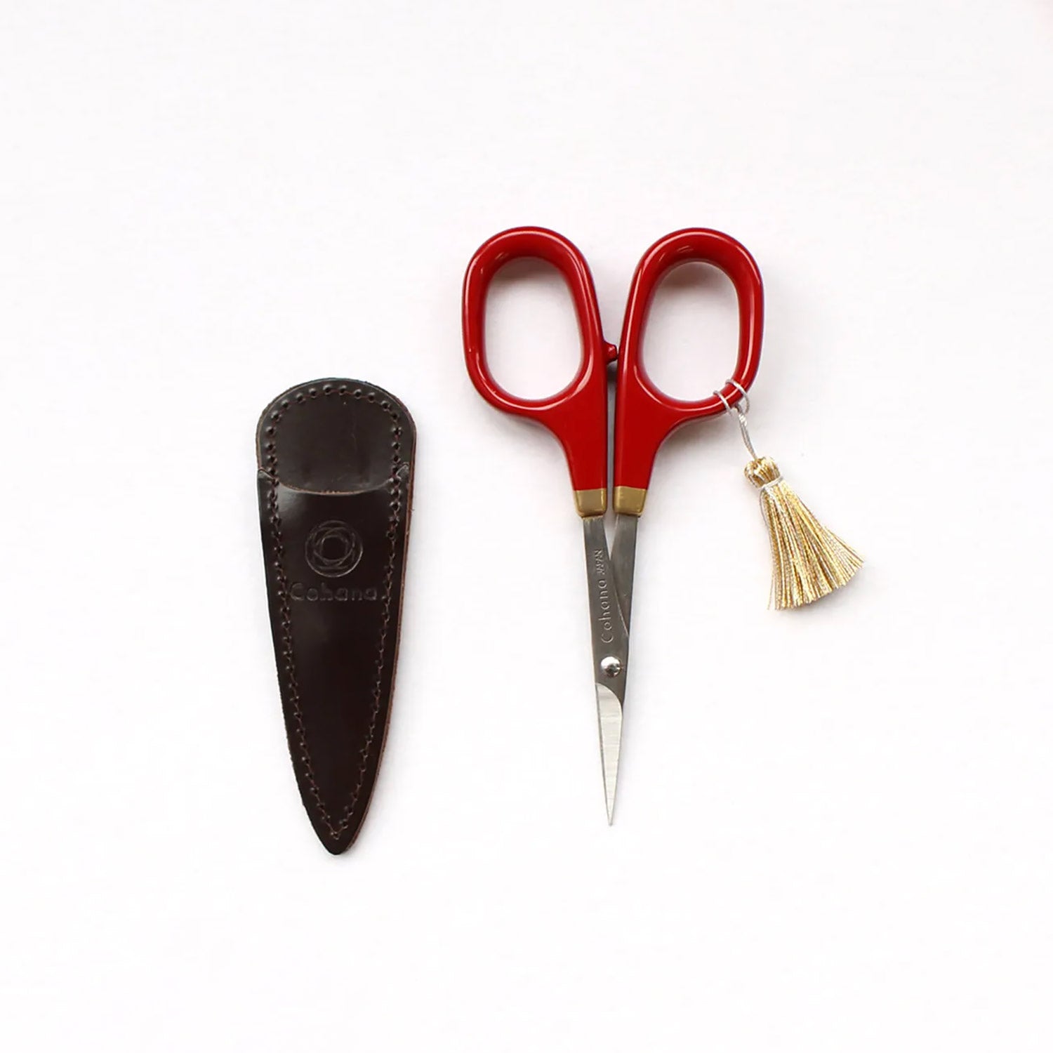 Petits ciseaux rouge et or de Cohana