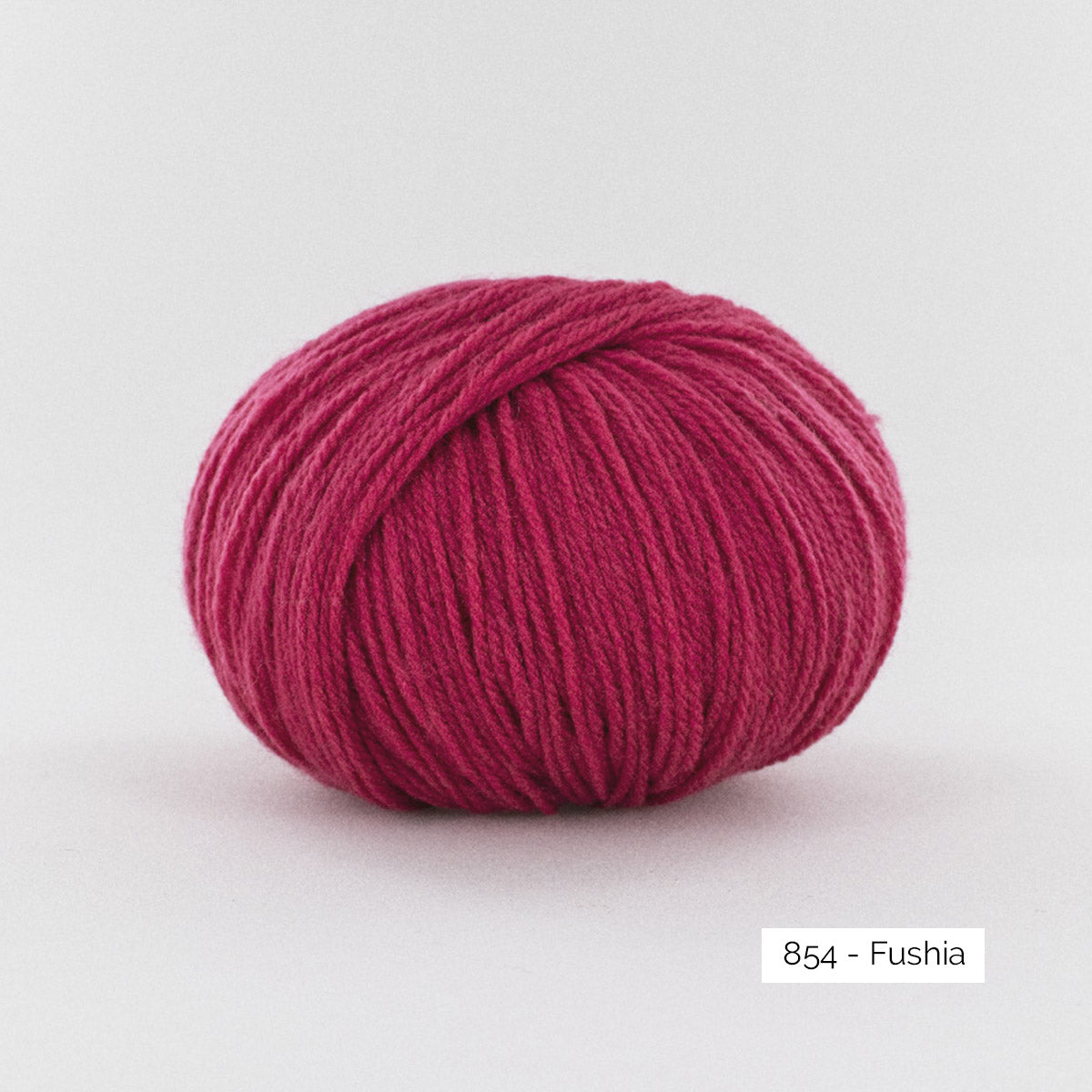 Pelote de mérinos extrafin superwash BB Mérinos de Fonty, coloris 854 Fuchsia