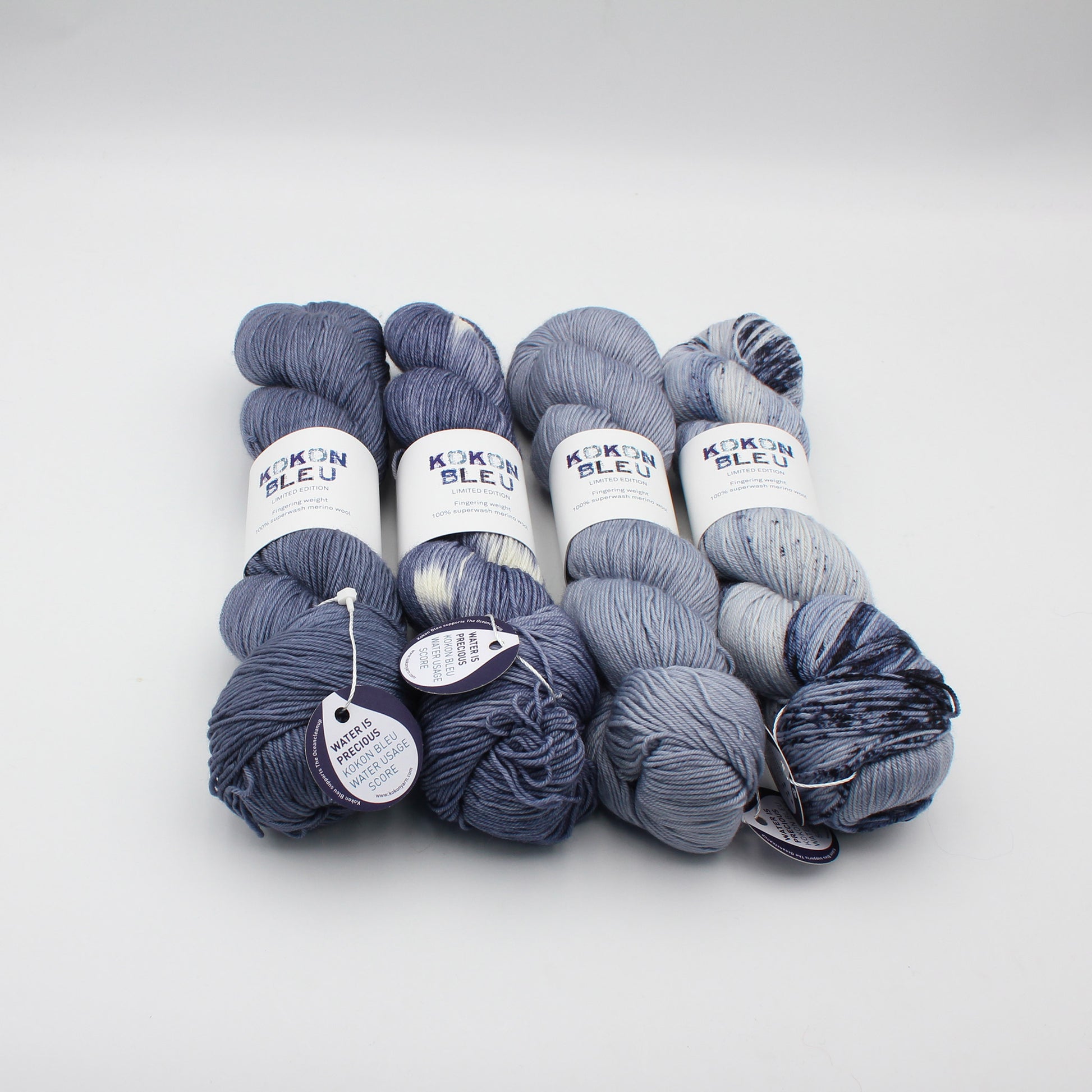 Echeveaux de Fingering de Kokon, coloris Jean-Michel, de gauche à droite : semisolid, tie-dye, fade 1, speckles