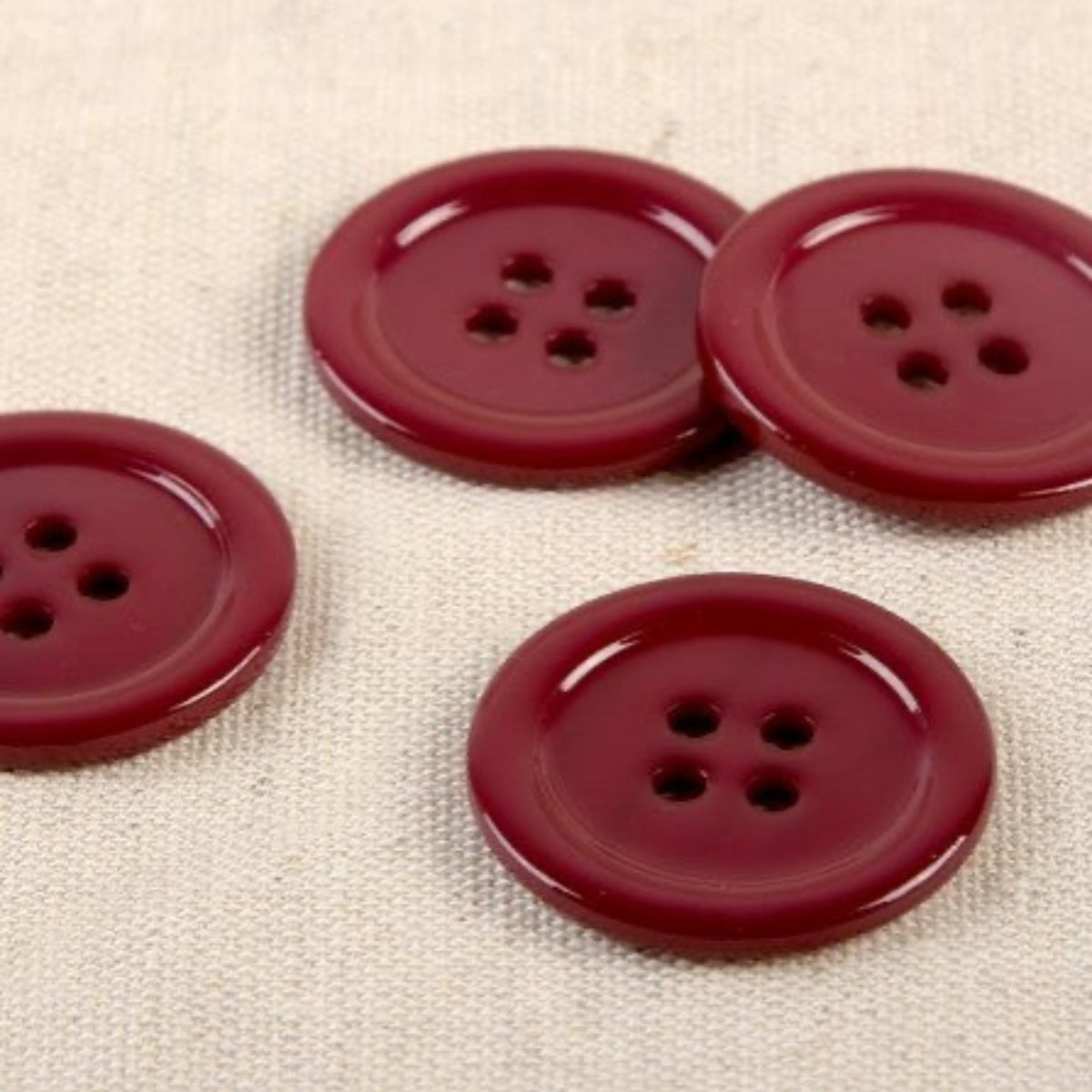 Boutons ronds de 25 mm en nacre coloris Bourgogne