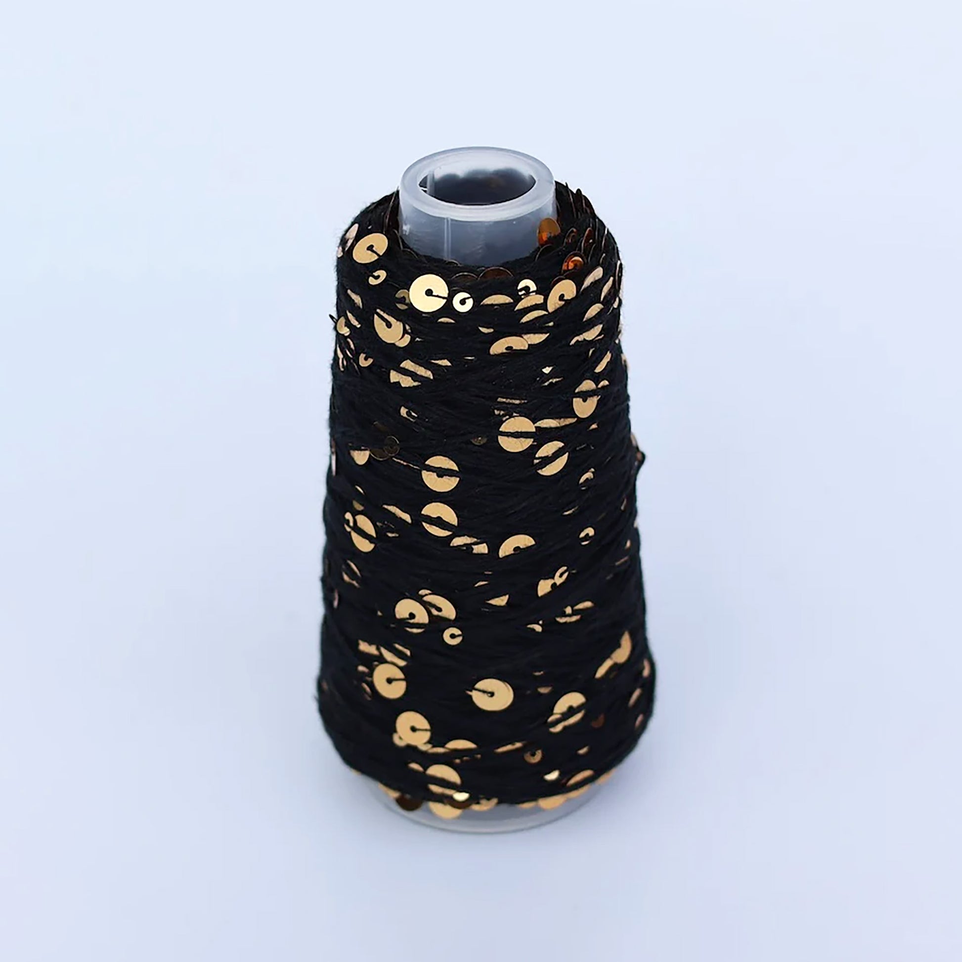 Cone de Sequins de Sysleriget, coloris 07 Gold and Black (Sortguld)