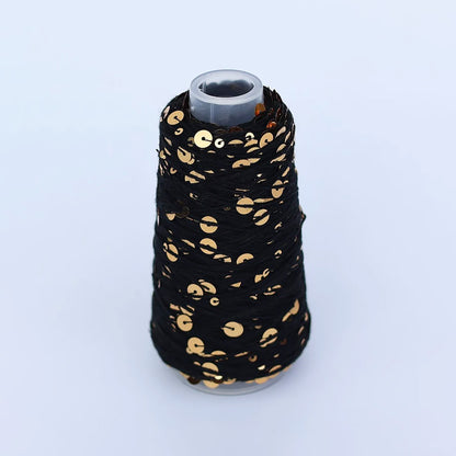 Cone de Sequins de Sysleriget, coloris 07 Gold and Black (Sortguld)